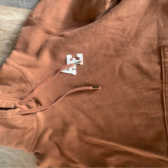 American Eagle brown sweatshirt with white letters. - Picture 3 of 4